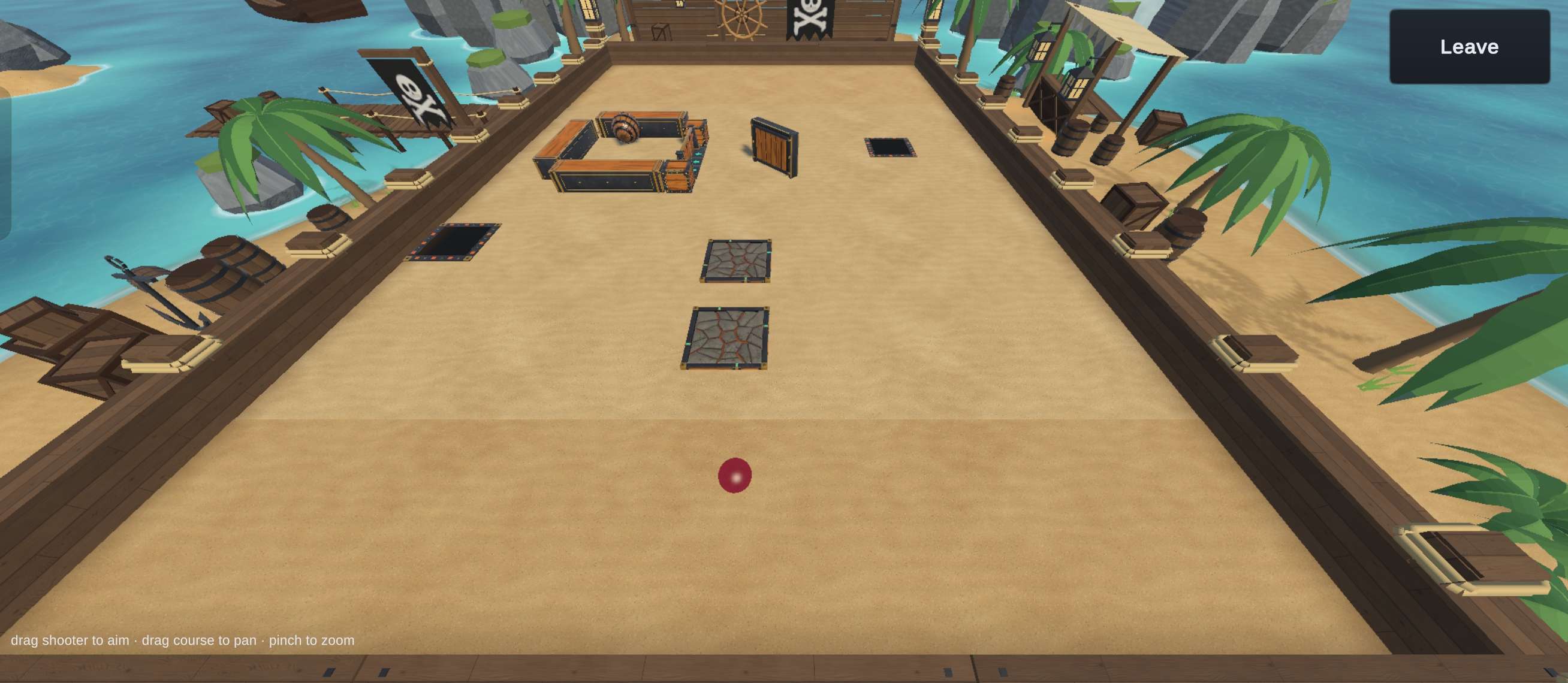 Outmarbled in-game screenshot: a pirate-themed course on a sandy beach, with the red shooter marble at the near end and the target marble inside a wooden-walled pen